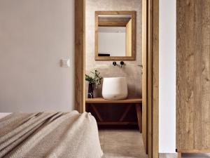 Troulis Apart-Hotel客房内的一张或多张床位