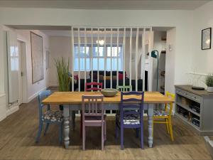 a kitchen and dining room with a table and chairs at 2A Front Street in Alnwick