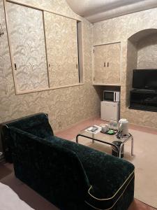 Kuchyň nebo kuchyňský kout v ubytování ロビンホテルRobin Hotel