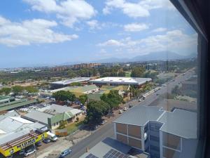 an aerial view of a city with buildings and a street at NEW BOSTON in Bellville
