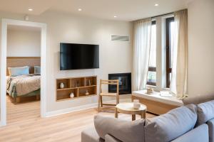 Llit o llits en una habitació de MAISON - ELEA 81 fotos més