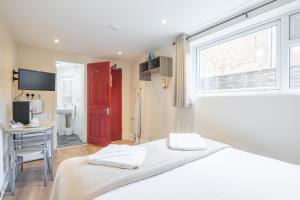 Rasa Sayang House - Self-check-in guesthouse客房内的一张或多张床位