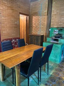 Kuchyň nebo kuchyňský kout v ubytování Chalés Sítio Do Tanque