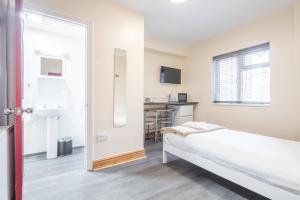 Rasa Sayang House - Self-check-in guesthouse客房内的一张或多张床位