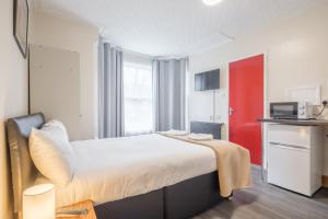 Rasa Sayang House - Self-check-in guesthouse客房内的一张或多张床位