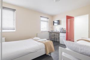 Rasa Sayang House - Self-check-in guesthouse客房内的一张或多张床位