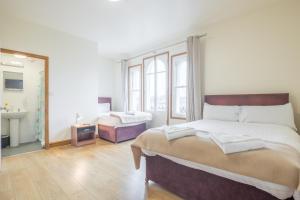Rasa Sayang House - Self-check-in guesthouse客房内的一张或多张床位