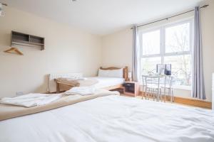 Rasa Sayang House - Self-check-in guesthouse客房内的一张或多张床位
