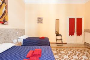 Katil atau katil-katil dalam bilik di Furio Camillo