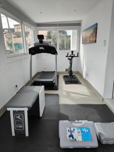 Fitnesscentret og/eller fitnessfaciliteterne på Villa Terracota, lujo en Granada y Sierra Nevada