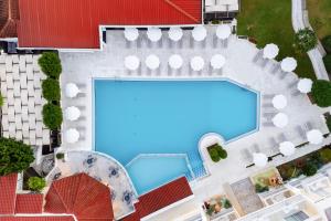 an overhead view of a swimming pool at a resort at Diana Palace Hotel Zakynthos in Argasi