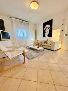 TV/trung tâm giải trí tại Veliero Fronte Mare Flexrent - Immobiliare Abissinia