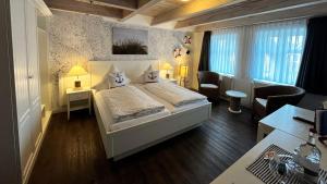 Postel nebo postele na pokoji v ubytování Hotel Anka