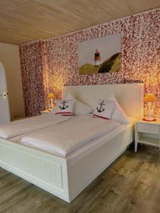 Voodi või voodid majutusasutuse Hotel Anka toas