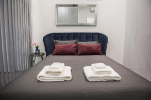 Posteľ alebo postele v izbe v ubytovaní STAY Urban Skin Suite