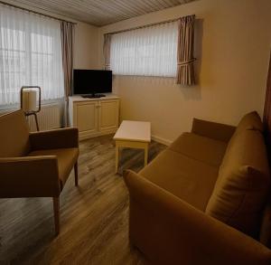 Televiisor ja/või meelelahutuskeskus majutusasutuses Hotel Anka