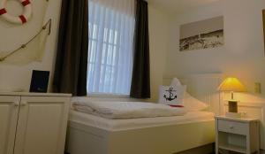 Voodi või voodid majutusasutuse Hotel Anka toas