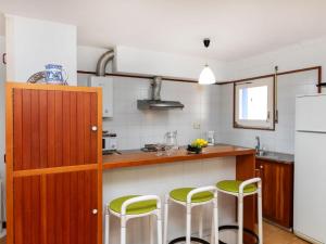 Kuchyňa alebo kuchynka v ubytovaní Holiday Home Delta 1 by Interhome