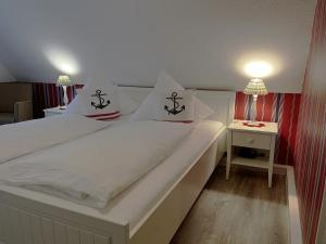 Voodi või voodid majutusasutuse Hotel Anka toas