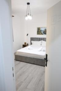 Postel nebo postele na pokoji v ubytování VILA ALIZEE Hotel
