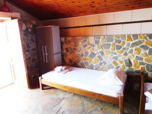 Ένα ή περισσότερα κρεβάτια σε δωμάτιο στο Thassos Fish Cave