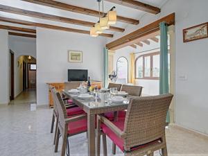 a dining room with a table and chairs at Holiday Home La Concha by Interhome in Balcon del Mar