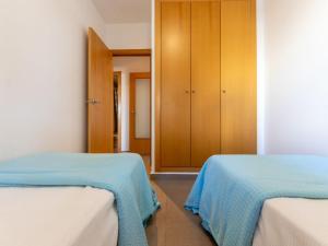 Posteľ alebo postele v izbe v ubytovaní Holiday Home Gaviota 11 by Interhome