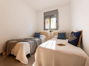 Posteľ alebo postele v izbe v ubytovaní Holiday Home Gaviota 10 by Interhome