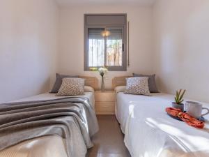 Posteľ alebo postele v izbe v ubytovaní Holiday Home Gaviota 10 by Interhome