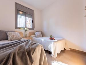 Posteľ alebo postele v izbe v ubytovaní Holiday Home Gaviota 10 by Interhome