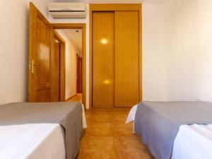 Posteľ alebo postele v izbe v ubytovaní Holiday Home Sally by Interhome