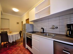 Kuchyň nebo kuchyňský kout v ubytování Apartment Olga-1 by Interhome + 21 fotografií