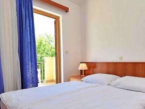 Posteľ alebo postele v izbe v ubytovaní Apartment Meridiana-3 by Interhome