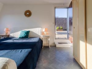Katil atau katil-katil dalam bilik di Apartment Cap Cabourg-22 by Interhome