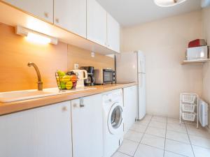 Kuchyň nebo kuchyňský kout v ubytování Apartment Le Grand Parc-6 by Interhome + 36 fotografií