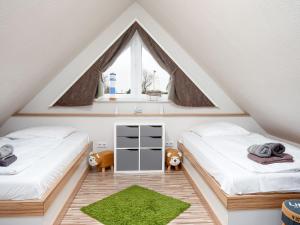 Postel nebo postele na pokoji v ubytování Apartment Meeresrauschen by Interhome