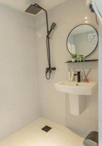a bathroom with a sink and a mirror at AVICENNIA BEACH DOMES in Salalah