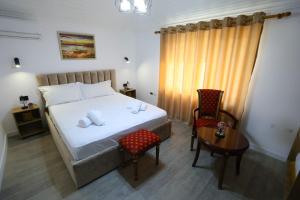 Postel nebo postele na pokoji v ubytování VILA ALIZEE Hotel