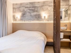 Ένα ή περισσότερα κρεβάτια σε δωμάτιο στο Holiday Home Natuurlijk de Veenhoop by Interhome