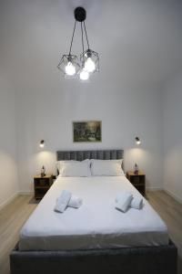 Postel nebo postele na pokoji v ubytování VILA ALIZEE Hotel