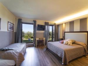 A bed or beds in a room at Holiday Home La Smarrita Dei Carradori by Interhome