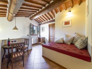 A bed or beds in a room at Holiday Home La Smarrita Dei Carradori by Interhome