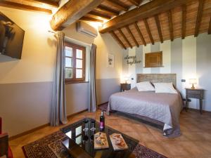 A bed or beds in a room at Holiday Home La Smarrita Dei Carradori by Interhome