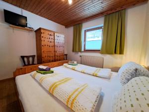 Posteľ alebo postele v izbe v ubytovaní Apartment Jaggler by Interhome