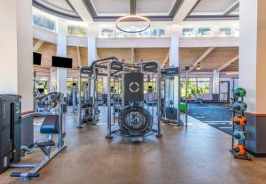 a gym with cardio equipment in a building at The Hotel at La Valle in Rancho Santa Fe