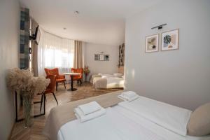 Posteľ alebo postele v izbe v ubytovaní Hotel Polonia