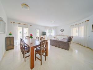 A television and/or entertainment centre at Holiday Home Cucarres by Interhome