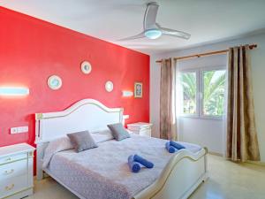 Łóżko lub łóżka w pokoju w obiekcie Holiday Home Cucarres by Interhome