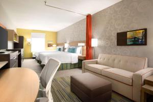 TV a/nebo společenská místnost v ubytování Home2 Suites by Hilton Houston Webster