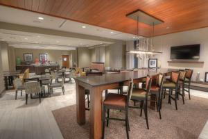 a dining room with a large table and chairs at Hampton Inn Gatlinburg Historic Nature Trail, Tn in Gatlinburg